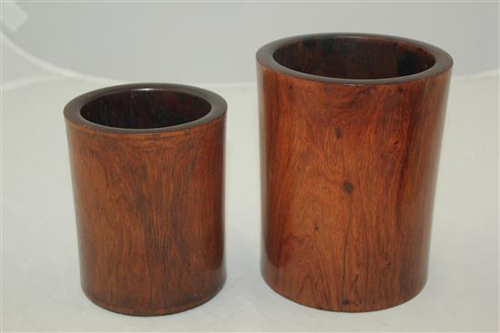 Two Chinese graduated huang huali brush pots, 18th century, 12.5cm and 15.2cm